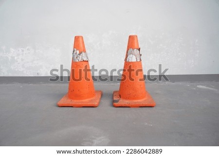 The traffic cones on the street securing the road works