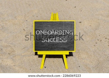 Onboarding success symbol. Concept words Onboarding success on black chalk blackboard on a beautiful sand beach background. Business onboarding success concept. Copy space.
