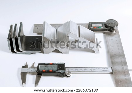 Sheet metal bending tool and equipment isolated on a white background. Electronic digital protractor