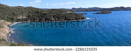 blue sea view and blue sky view, blue sea , mountains and forest
