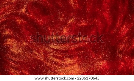 Amazing gold particles in red fluid. Sparkling glittering dust particles stains and overflows. Abstract liquid background with gold waves and red tints. Royalty-Free Stock Photo #2286170645