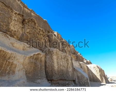 Pyramid of cheops in detail. The Great Pyramid of Giza is the largest Egyptian pyramid and the tomb of Fourth Dynasty pharaoh Khufu. Royalty-Free Stock Photo #2286186771
