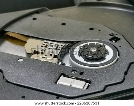 Close up image dvd and cd recorder drive on computer.
