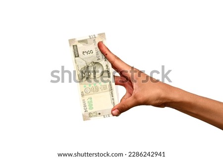 Hand holding Indian 500 rupee note, Selective focus Royalty-Free Stock Photo #2286242941