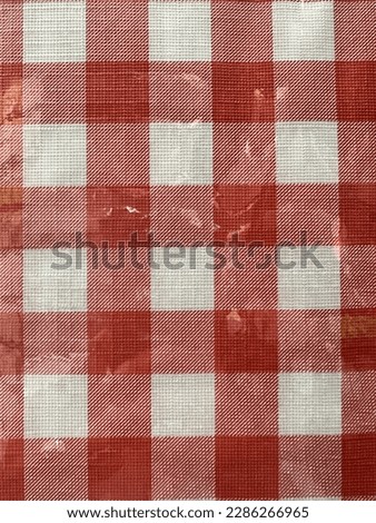 Plaid cloth in a plastic bag
