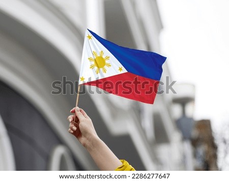 philippines flag. Large Philippines flag waving in the wind. Royalty-Free Stock Photo #2286277647