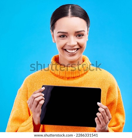 Tablet, mockup and smile with portrait of woman in studio for website, technology and social media. Networking, internet and connection with female on blue background for app, announcement and search