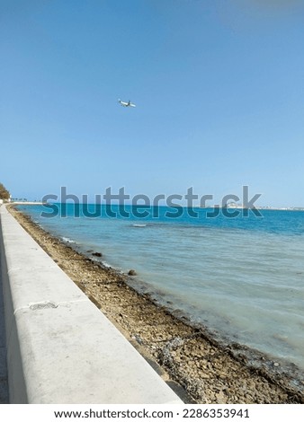 A beautiful view of Sea. A photo of shore of sea. Two colour water in one place picture. A nature Beauty view. A picture From My favourite places Qatar Sea view.