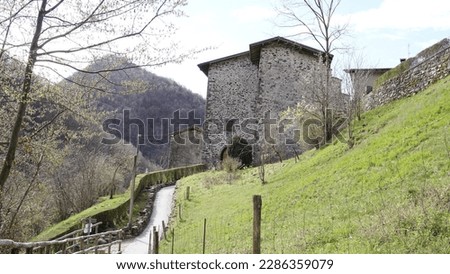 Enchanting Cornello dei Tasso: A Journey Through Time and Postal Legacy. Brembana Valley, Bergamo province. Historic site, porticoes, landscapes and view of the medieval rural alpine village
