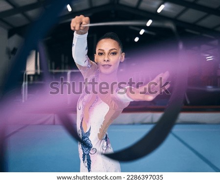 Ribbon, gymnastics and portrait of woman dance for performance, sports competition and action show. Female, rhythmic movement and dancing athlete with creative talent, concert event or practice arena
