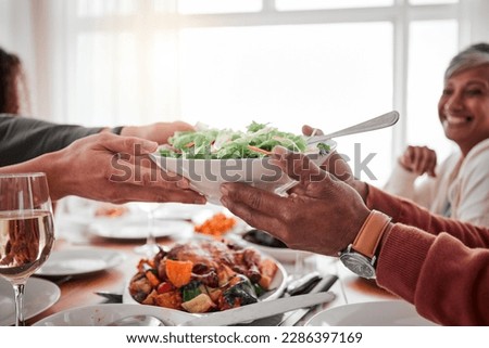 Food, salad and hands with dinner and party, social gathering or event with family or friends and celebration. Holiday, fun and feast with love, meal and nutrition, people have meal together