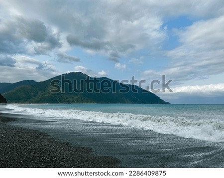 Landscape photo of a beach at Suao of Yilan, Taiwan with water of different colors