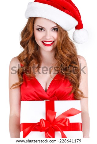 christmas, x-mas, winter, happiness concept - smiling woman in santa helper hat with many gift boxes. picture of cheerful santa helper girl with gift box isolated on white. studio shot
