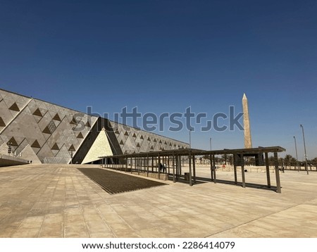 Pictures of the brand new Grand Egyptian Museum from outside with its Pyramids like shape Royalty-Free Stock Photo #2286414079