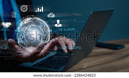 Businessperson confidently holds globe, symbolizing global reach, influence harness power of electronic, cloud computing technologies to manage large amounts of information, drive worldwide enterprise Royalty-Free Stock Photo #2286424823