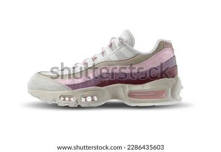 White sneaker with red, purple accent color on a isolated white background 