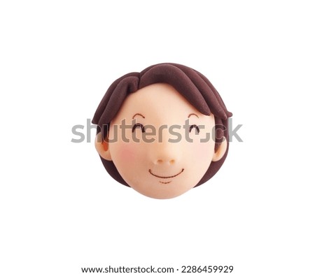 Smiling woman's face(This is a photo of a clay work)