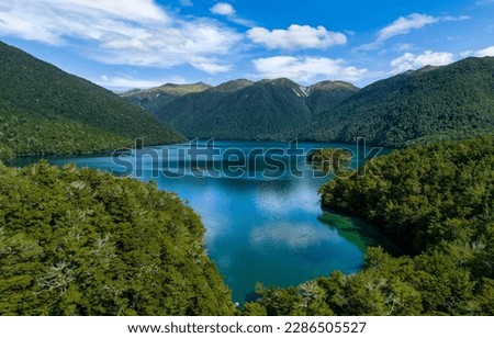 View of a beautiful mountain lake. Mountain lake view. Lake in mountain forest. Beautiful mountain lake landscape Royalty-Free Stock Photo #2286505527