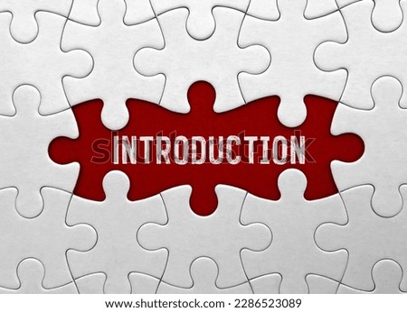 Word Introduction on red puzzle background Royalty-Free Stock Photo #2286523089