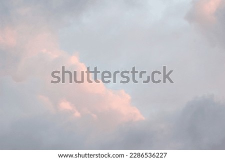 pastel coloured fluffy clouds background Royalty-Free Stock Photo #2286536227