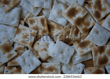 he thin bubbles of the unleavened bread rise to the surface, creating a visually interesting and appealing texture. This traditional bread is a reminder of the rich history and culinary traditions