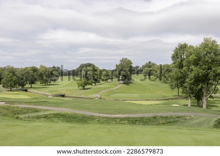 Wide green golf course picture