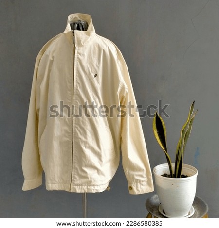 the photo shows a male jacket for traine
