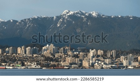 Skyline of mountain ridge surrounding  Vancouver downtown, British Columbia