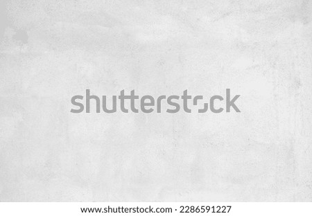 White cement wall in retro concept. Old concrete background for wallpaper or graphic design. Blank plaster texture in vintage style. Modern house interiors that feel calm and simple. Royalty-Free Stock Photo #2286591227