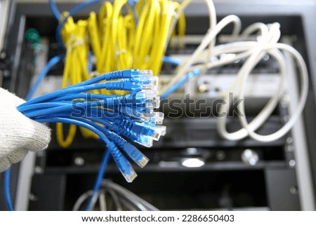 Hand choose lots of RJ45 UTP Cat6 LAN internet network cable fiber optic and Lots of Ethernet cables for data link connect computer server networking devices system to switch or hub modem router.