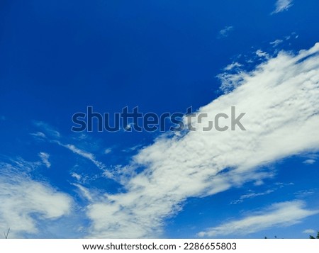 Blue sky background with white clouds. copy space for text 