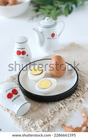 Boiled chicken egg, isolated white background