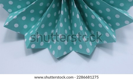 white mint polkadots paper decoration at the top of the screen isolated background