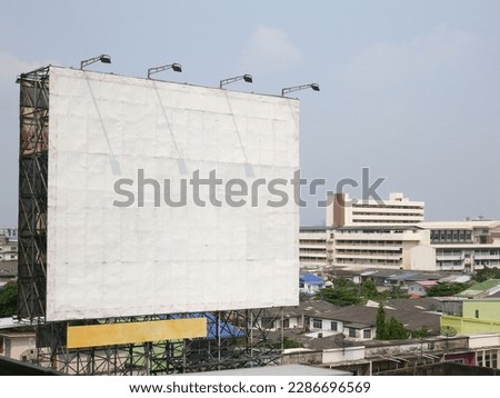 Blank billboard sign for Mockup, urban area in Thailand