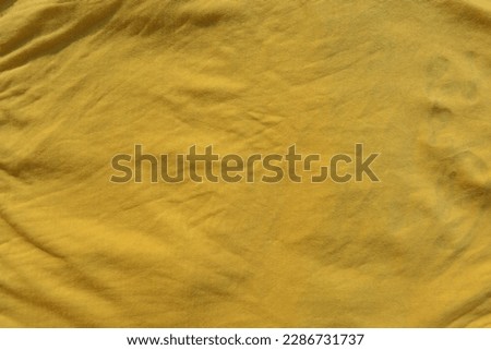 Old Cloth for background and texture. Yellow Old cloth  style textile. 