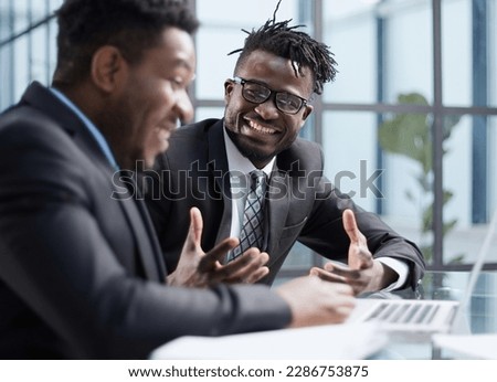 African american boss negotiating discussing contract details with company corporate client.