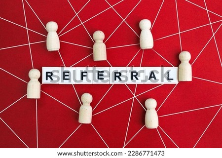 wooden figures with referral alphabet words. reference concept. recruiting strategy in which employers encourage current employees.  Royalty-Free Stock Photo #2286771473