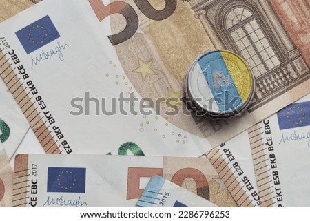 euro coin with national flag of canary islands on the euro money banknotes background