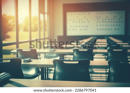 Empty defocused university classroom. Blurred school classroom without students with empty chairs and tables. Business conference room Royalty-Free Stock Photo #2286797041