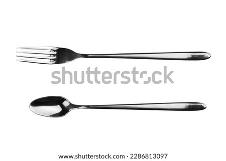 dessert spoon and fork made of stainless steel, isolated on a white background