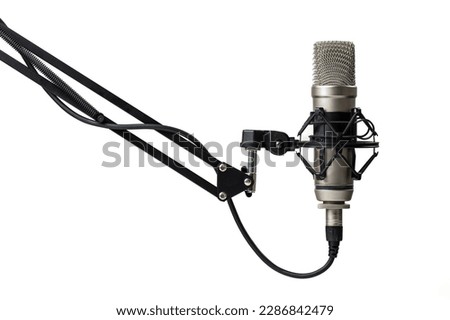 Professional microphone for podcasting on stand infront of white background Royalty-Free Stock Photo #2286842479