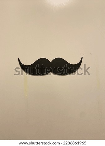 Moustache sign on the door.