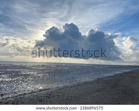 Moody winter cloud formation over the sea