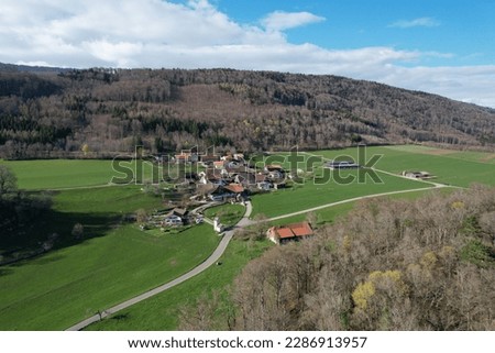 The village of Gaicht in Switzerland. Areal view looking in the direction of the Jura moutains