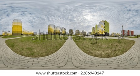 360 hdri panorama view with skyscrapers in new modern residential complex with high-rise buildings in townwith overcast sky in equirectangular spherical projection, ready AR VR virtual reality content