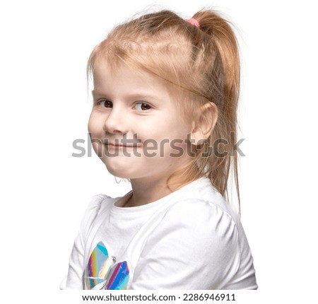 Portrait smiling child girl isolated on white background portrait of a happy little girl on a uniform background in the studio