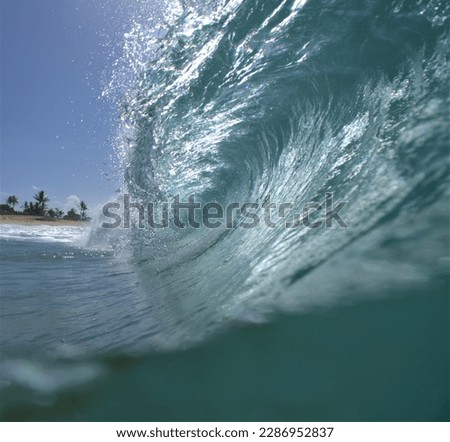 surfing and catching waves while capturing breathtaking pictures