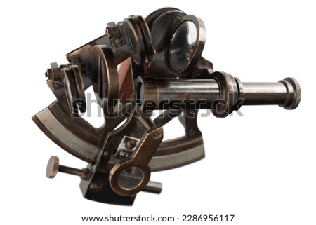 Antique bronze sextant isolated on white background