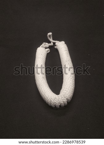 scout rope with a black background