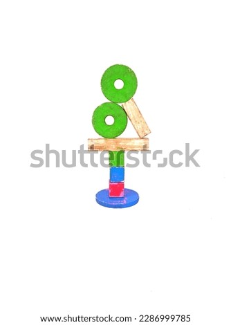 balance concept Wooden building blocks isolated on white background